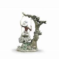 Load image into Gallery viewer, Swinging Woman Figurine
